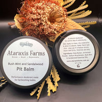 Ataraxis Farms Pit Balm natural deodorant tin displaying the front and back lid with product information.