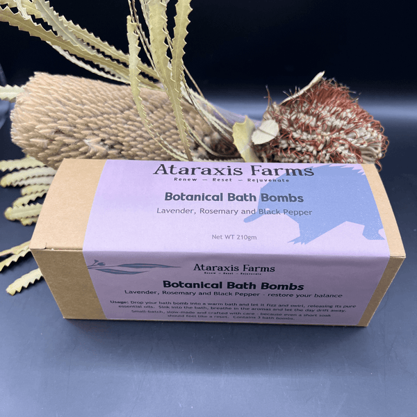 Small-batch lavender, rosemary and  black pepper botanical bath bombs handmade at Ataraxis Farms