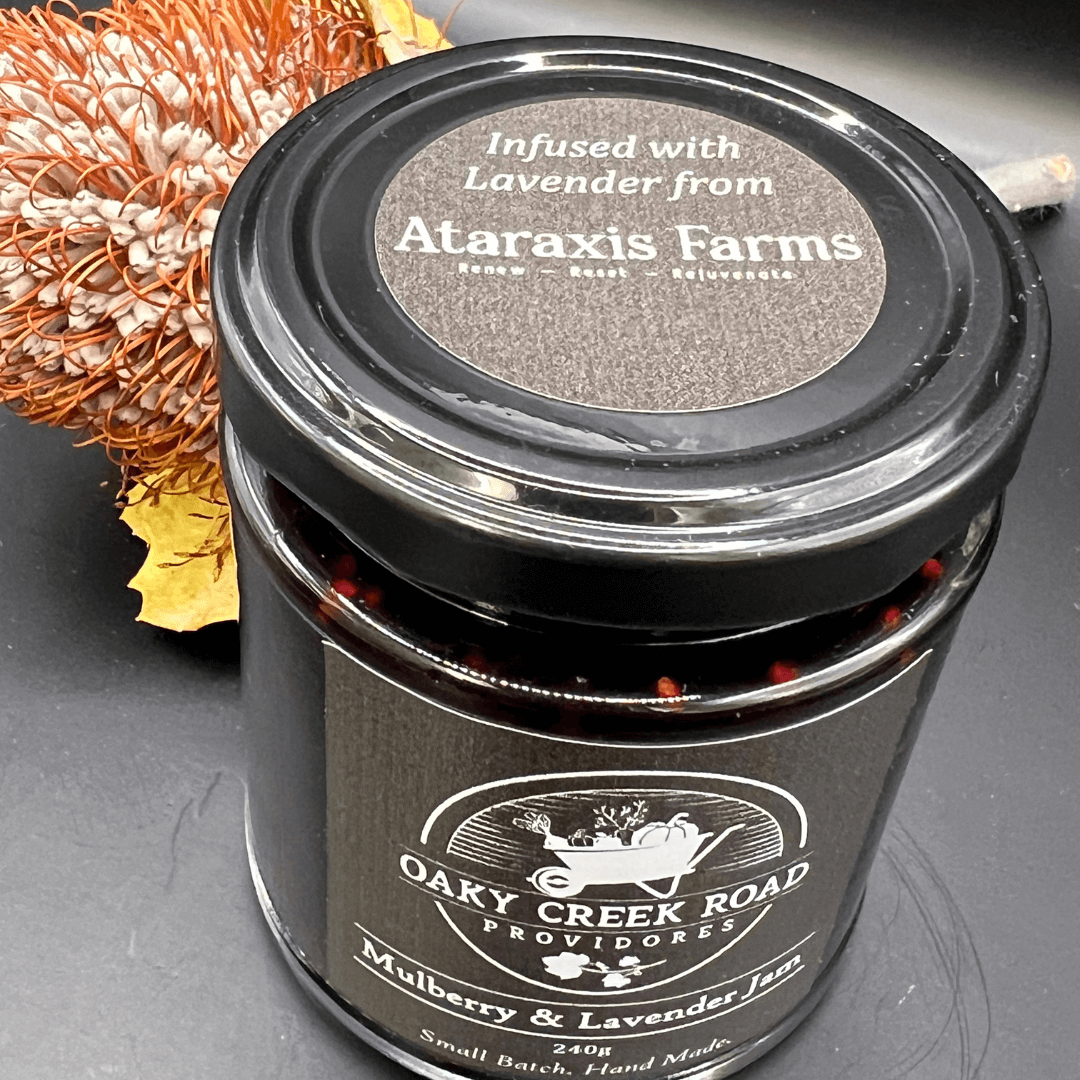 Jar of Oaky Creek Road Mulberry and Lavender Jam infused with lavender from Ataraxis Farms. 