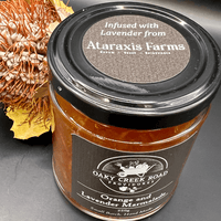 Jar of Oaky Creek Road Orange and Lavender Marmalade infused with lavender from Ataraxis Farms. 