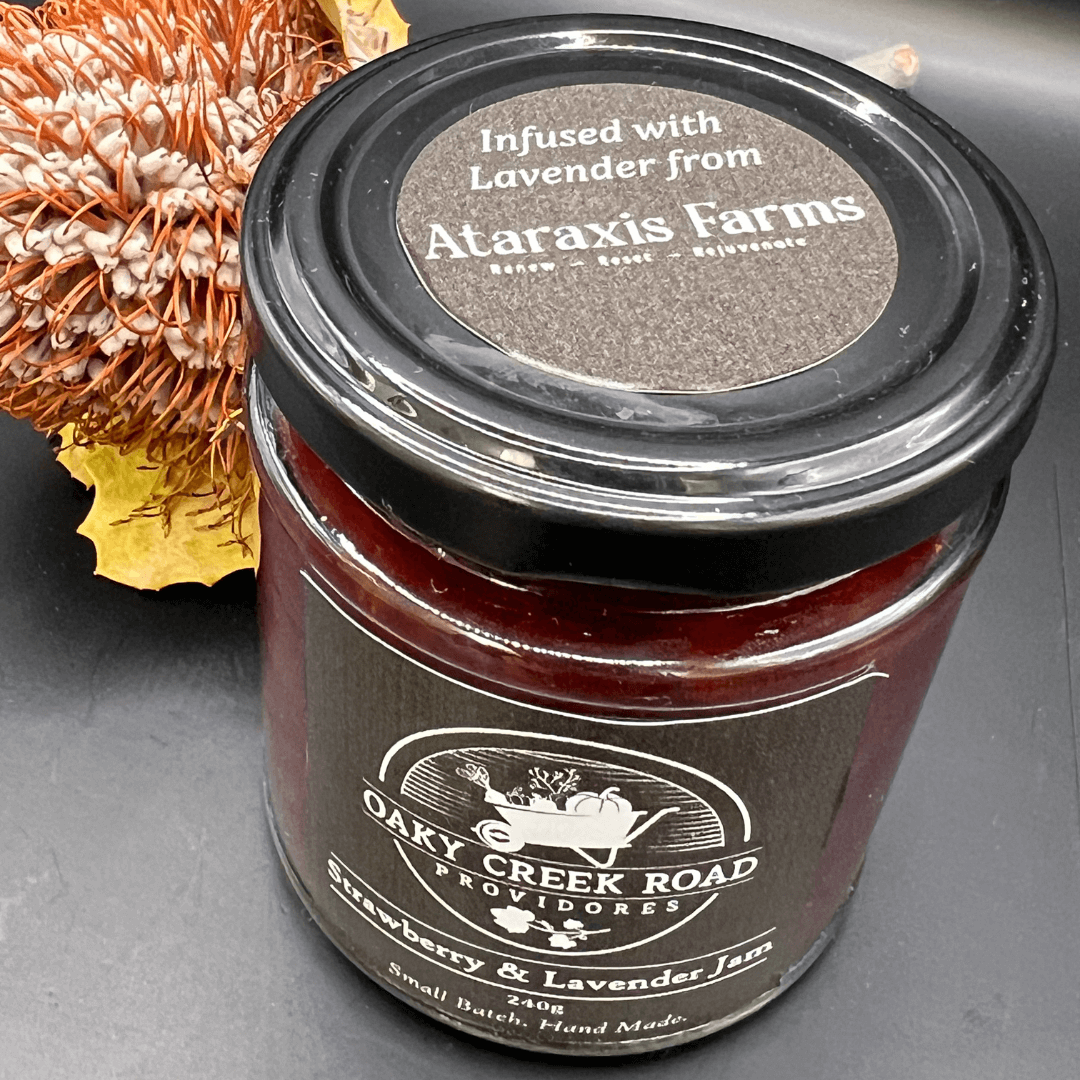 Jar of Oaky Creek Road Strawberry and Lavender Jam infused with lavender from Ataraxis Farms. 