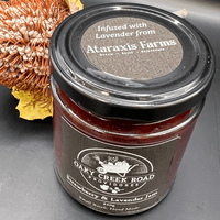 Jar of Oaky Creek Road Strawberry and Lavender Jam infused with lavender from Ataraxis Farms. 