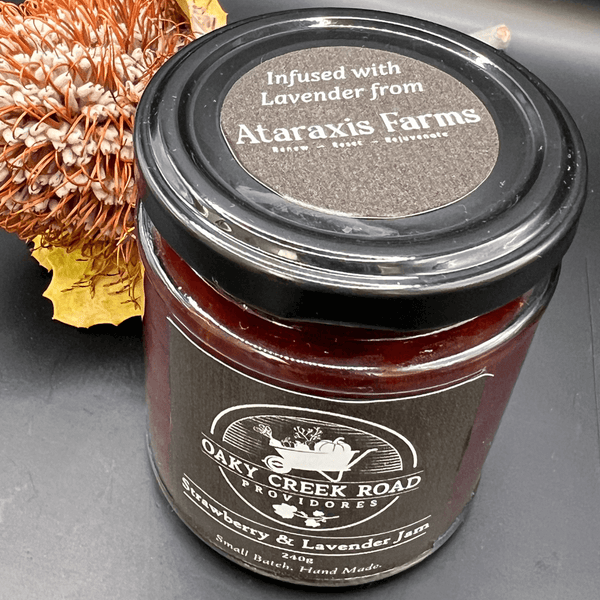 Jar of Oaky Creek Road Strawberry and Lavender Jam infused with lavender from Ataraxis Farms. 